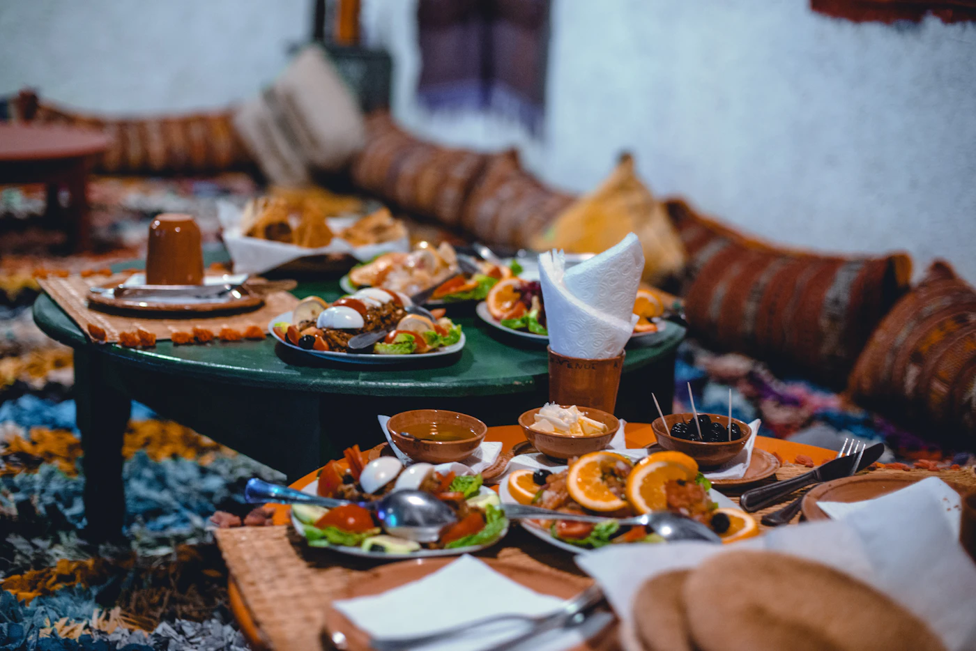 Moroccan dishes spread across a table, showing how far a teacher budget stretches on food in Morocco