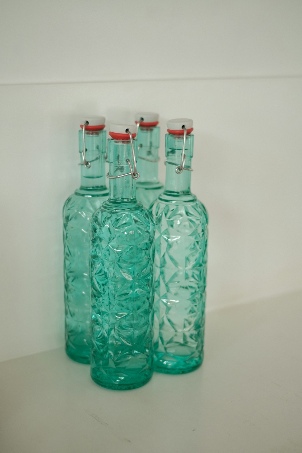 a group of glass bottles