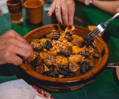 a person eating a bowl of food