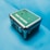 A green and silver first aid box with metal corners and locks is positioned on a solid light blue background. The box has prominent text on the top indicating its purpose.