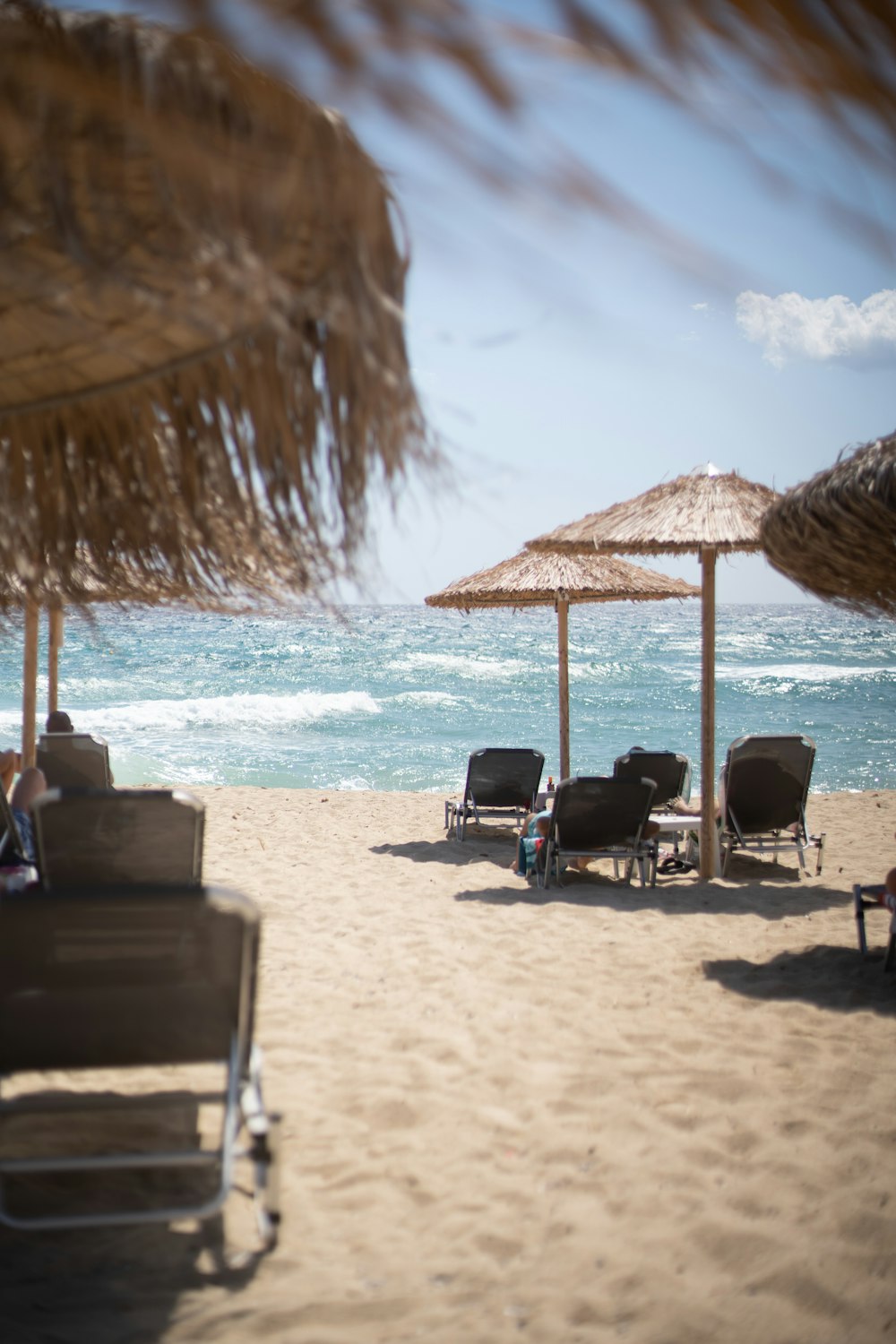 chairs and umbrellas on a beach