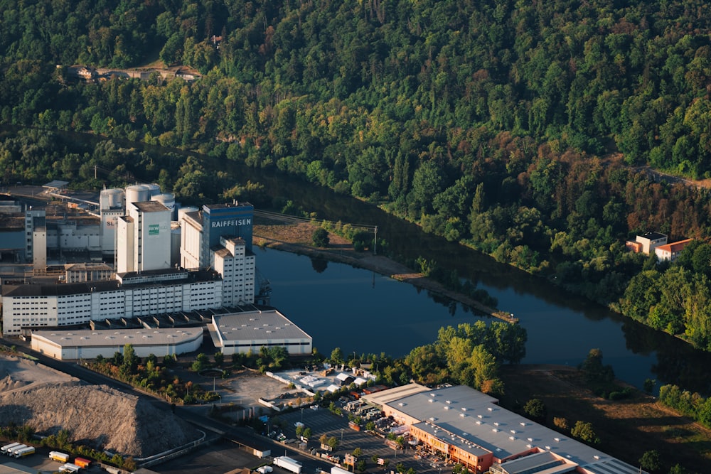 a river with buildings and trees around it