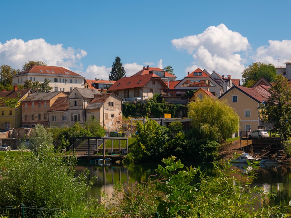 a body of water with buildings around it