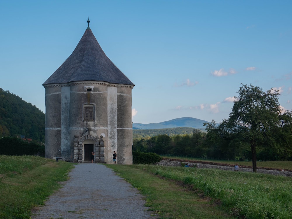 a stone building with a steeple