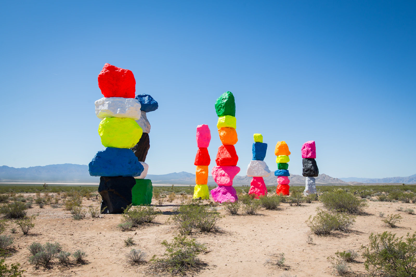 Colorful stacked boulders of the Seven Magic Mountains art installation in the desert near Las Vegas, Nevada