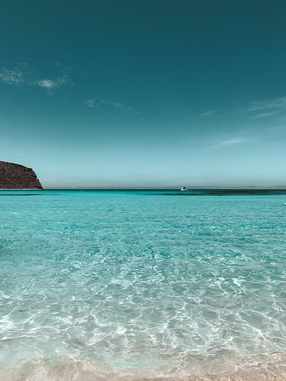 a body of water with a boat in it