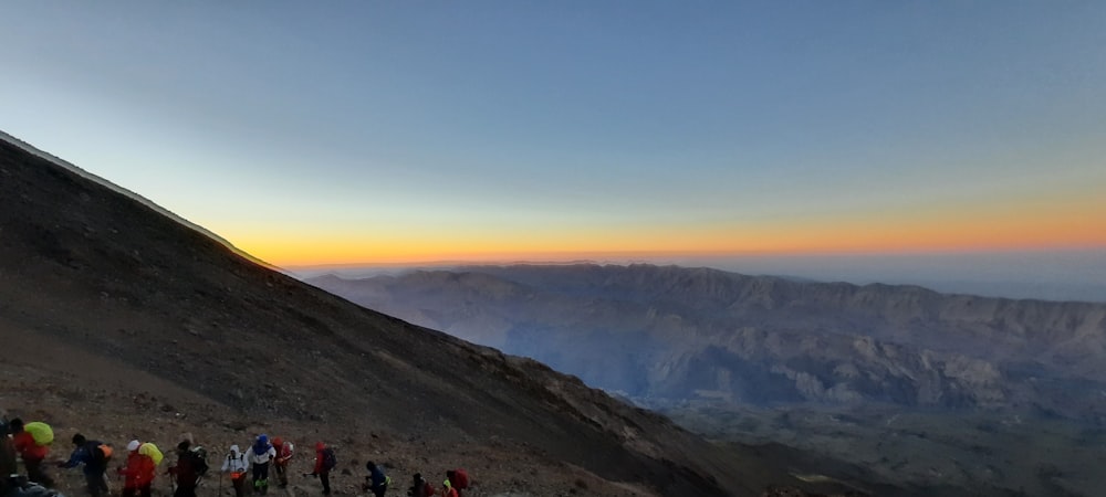 a group of people on a mountain