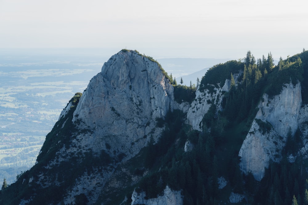 a rocky cliff with snow