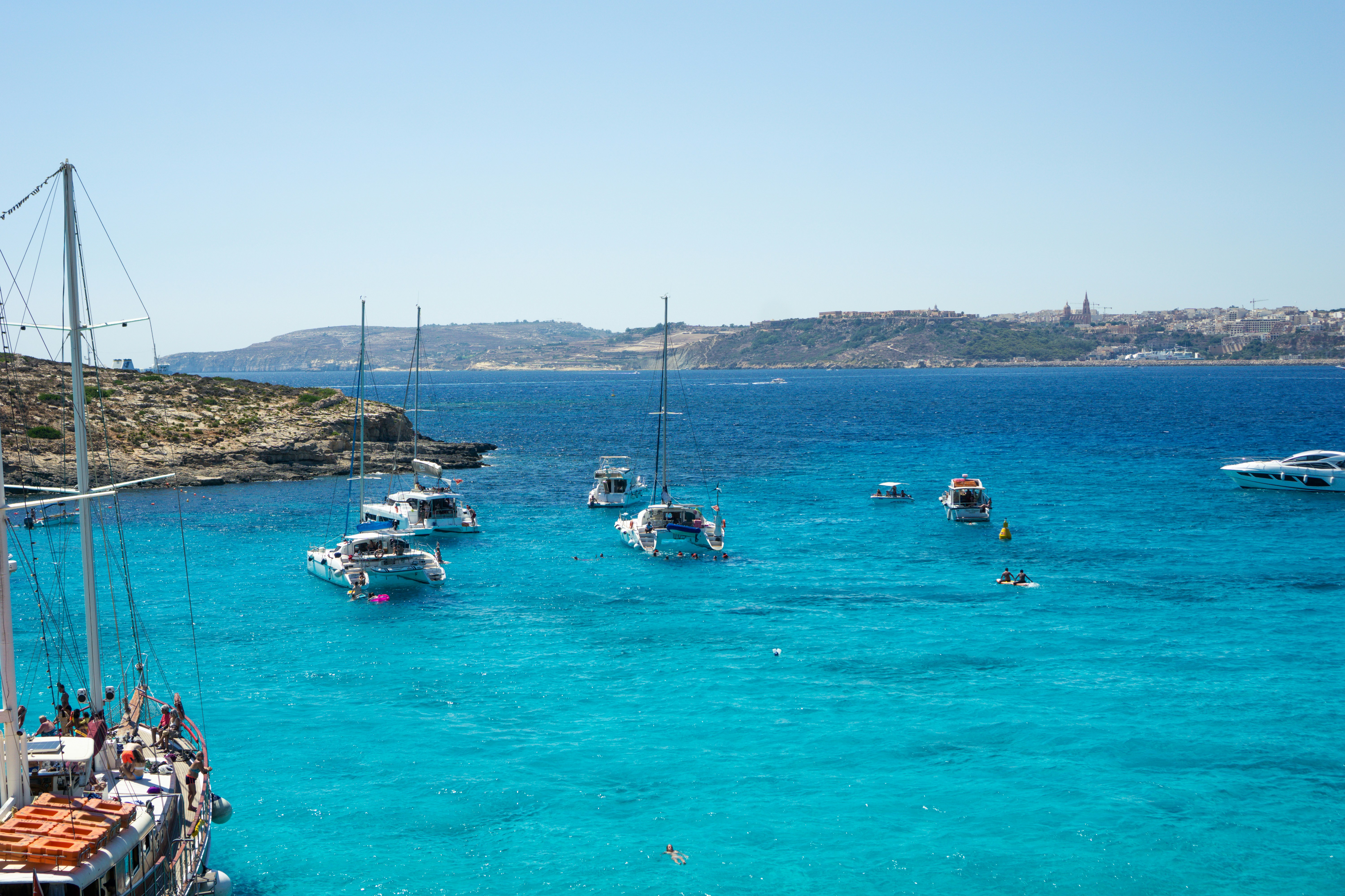 a group of boats in a body of water