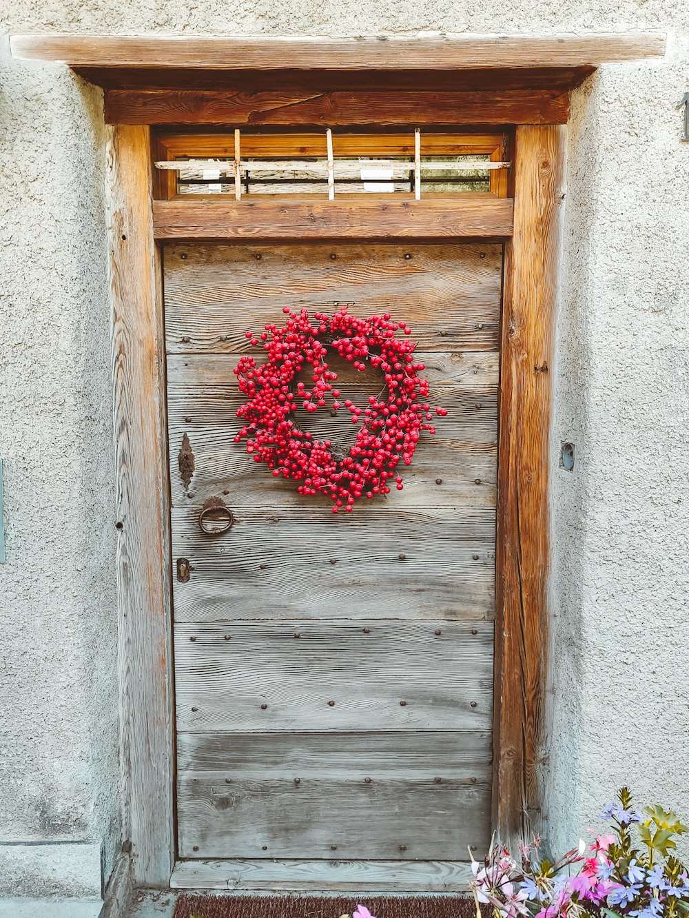 a door with a wreath on it