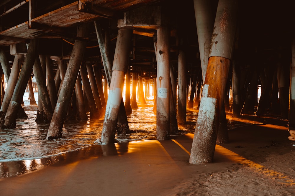 a wooden structure with water coming out of it