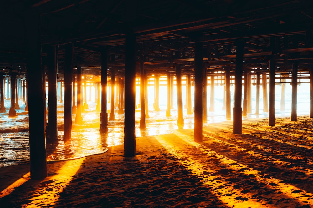 a row of wooden pillars