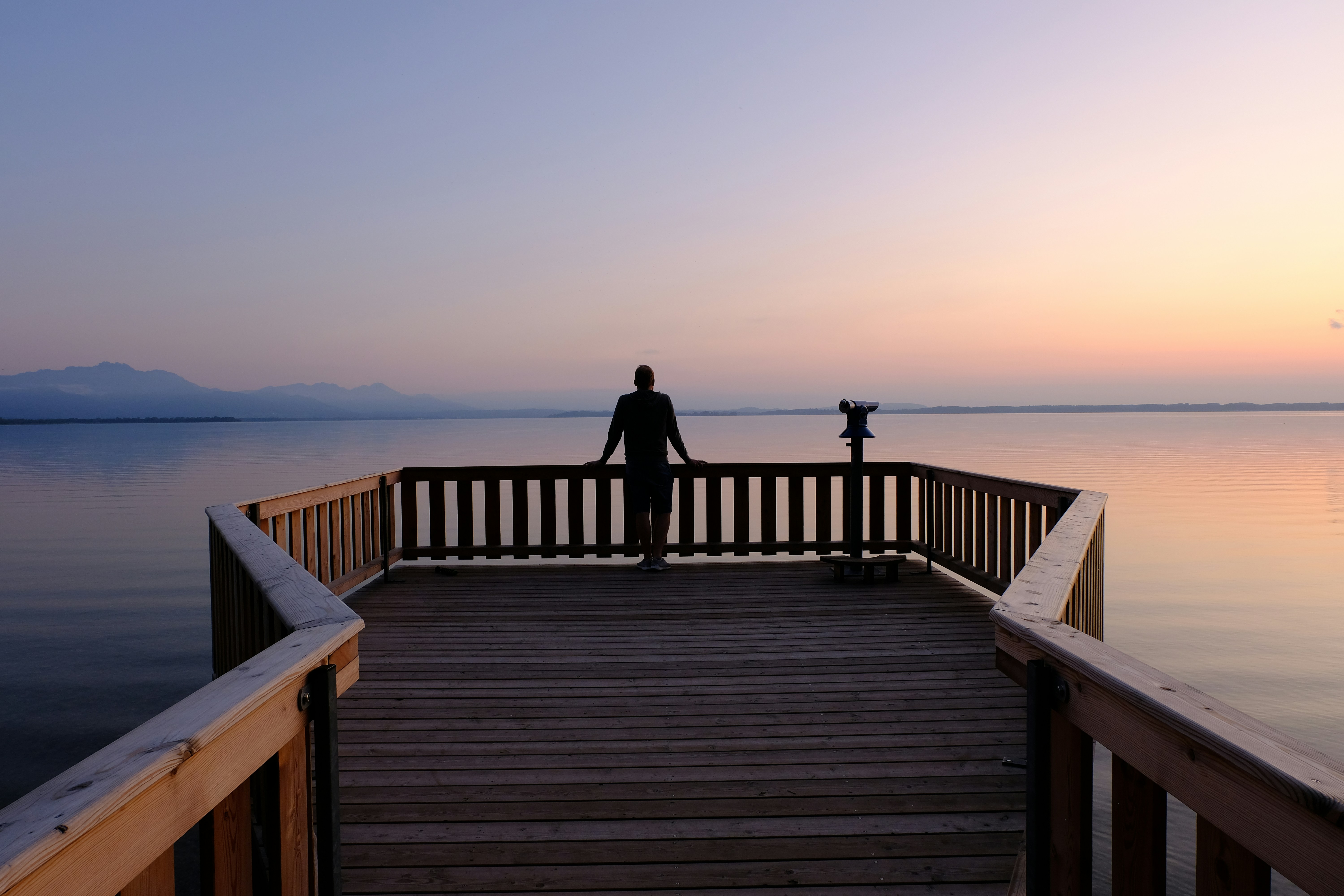 a person walking on a dock