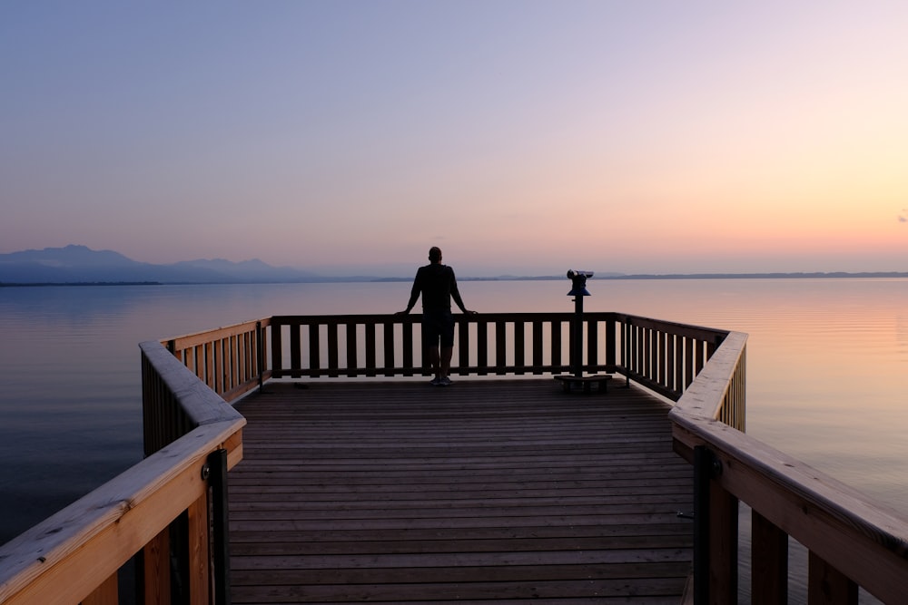 a person walking on a dock