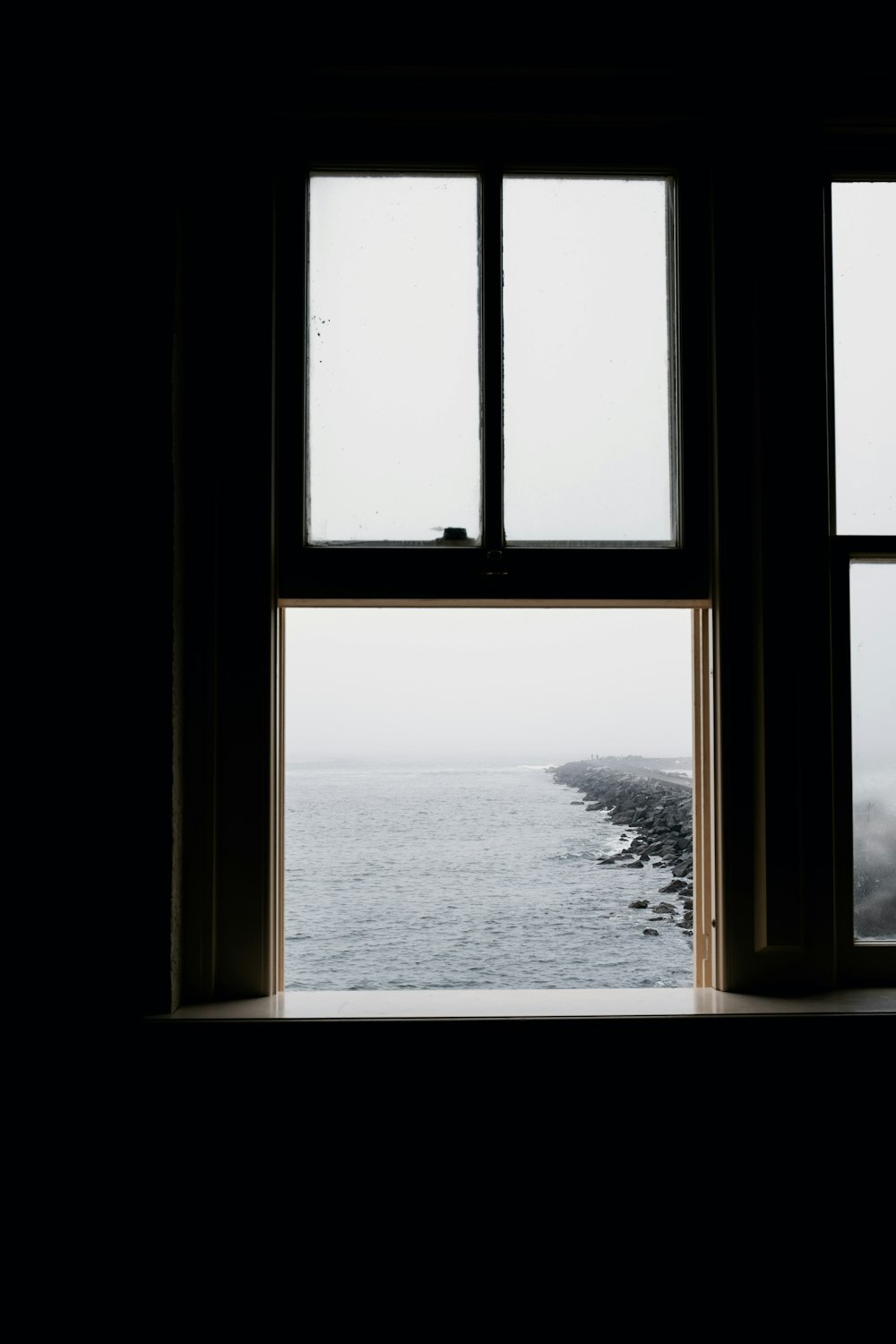 a view of the ocean from a window