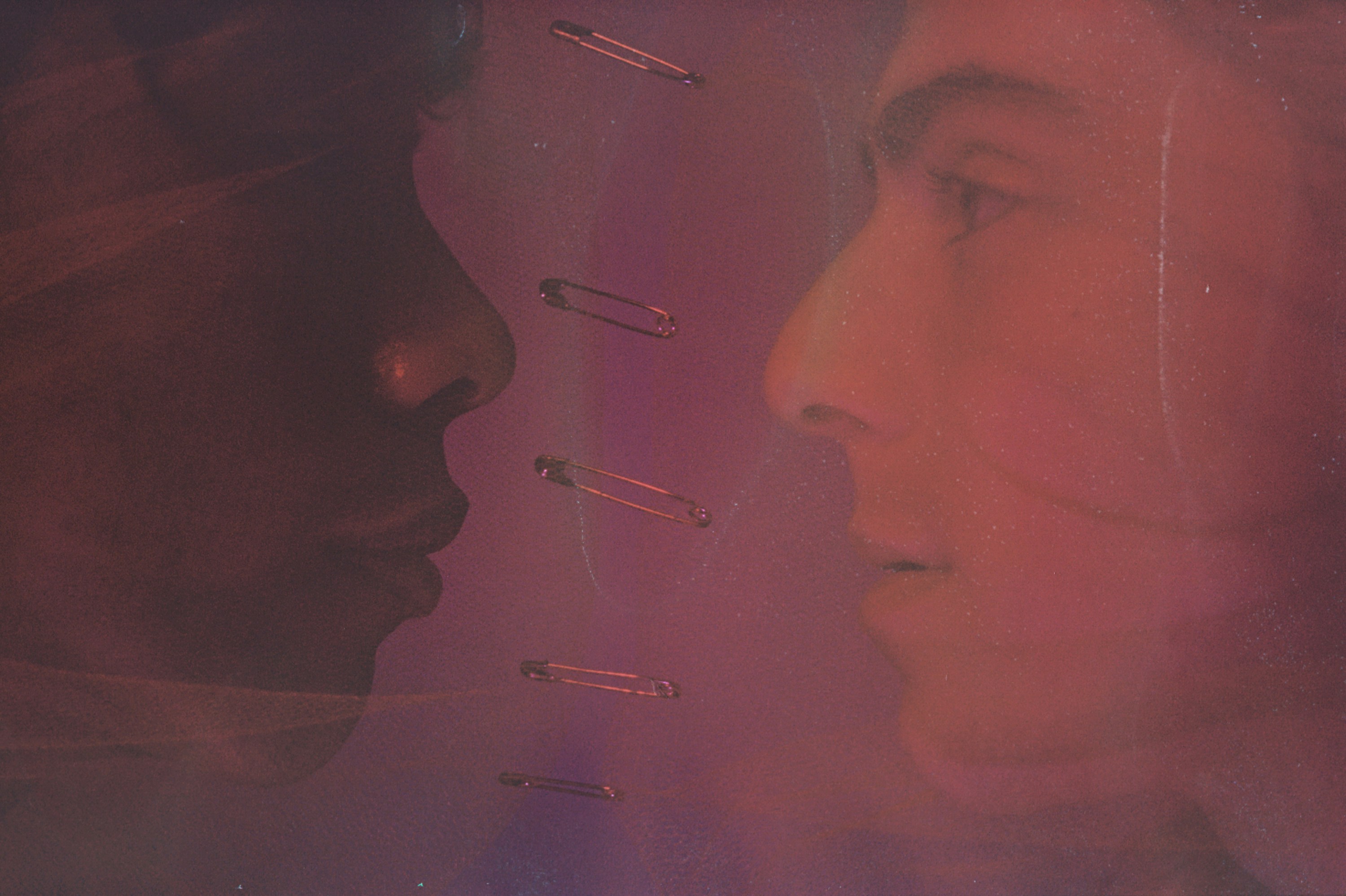 a man and woman looking at each other