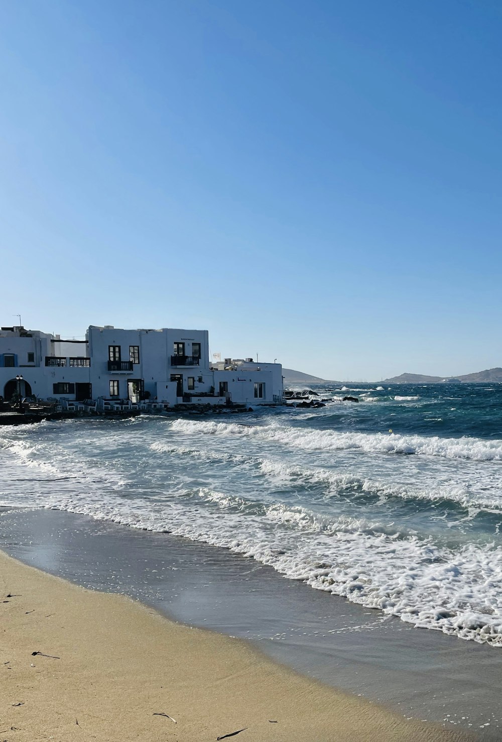 a beach with a building on it