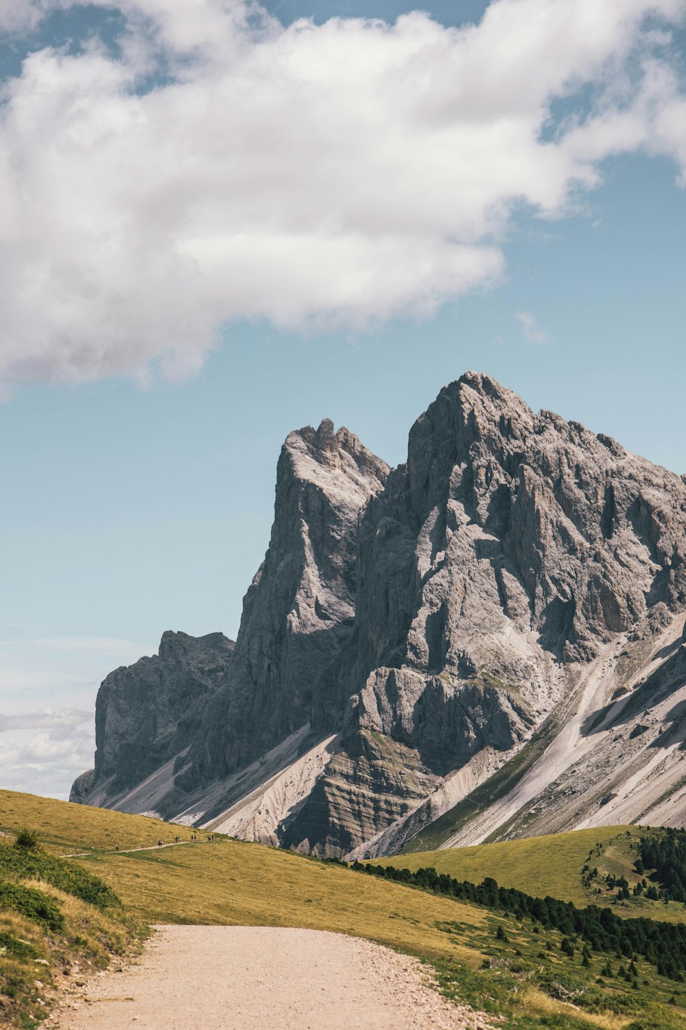 a mountain with a dirt road