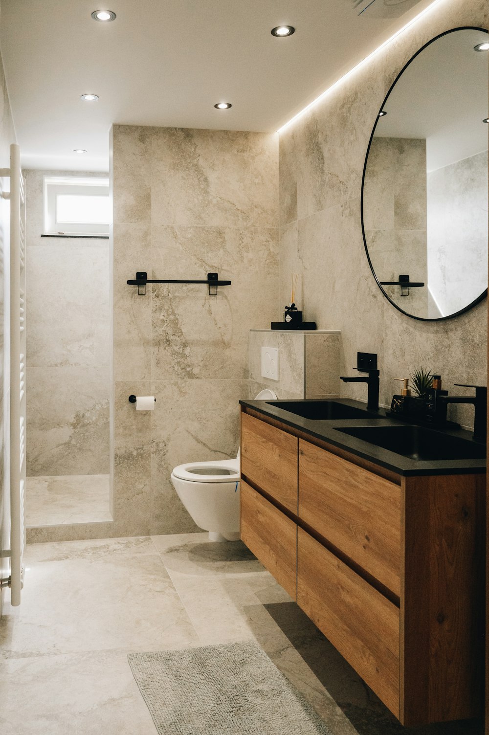 a bathroom with a large mirror