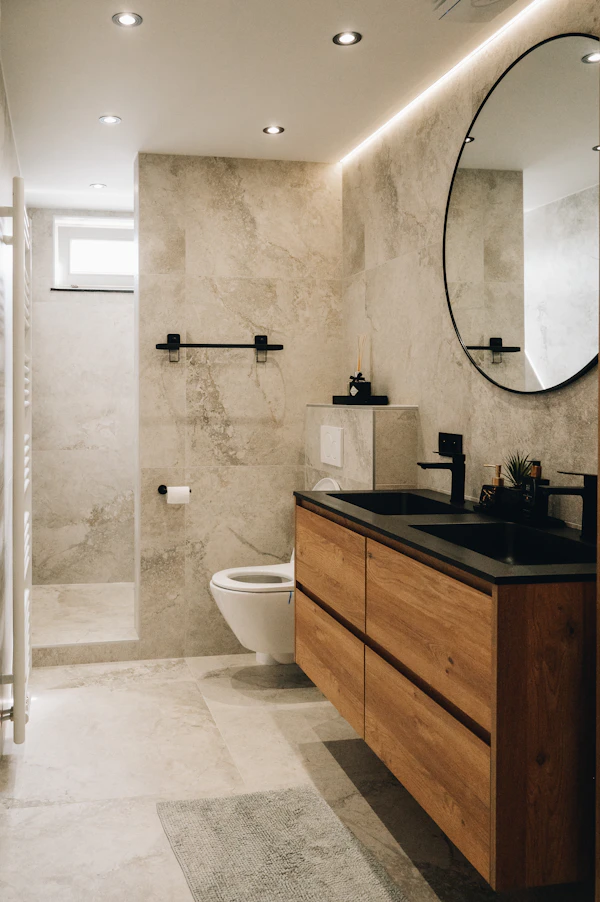 Premium bathroom vanity — designer mirrors and polished fixtures in a luxury home