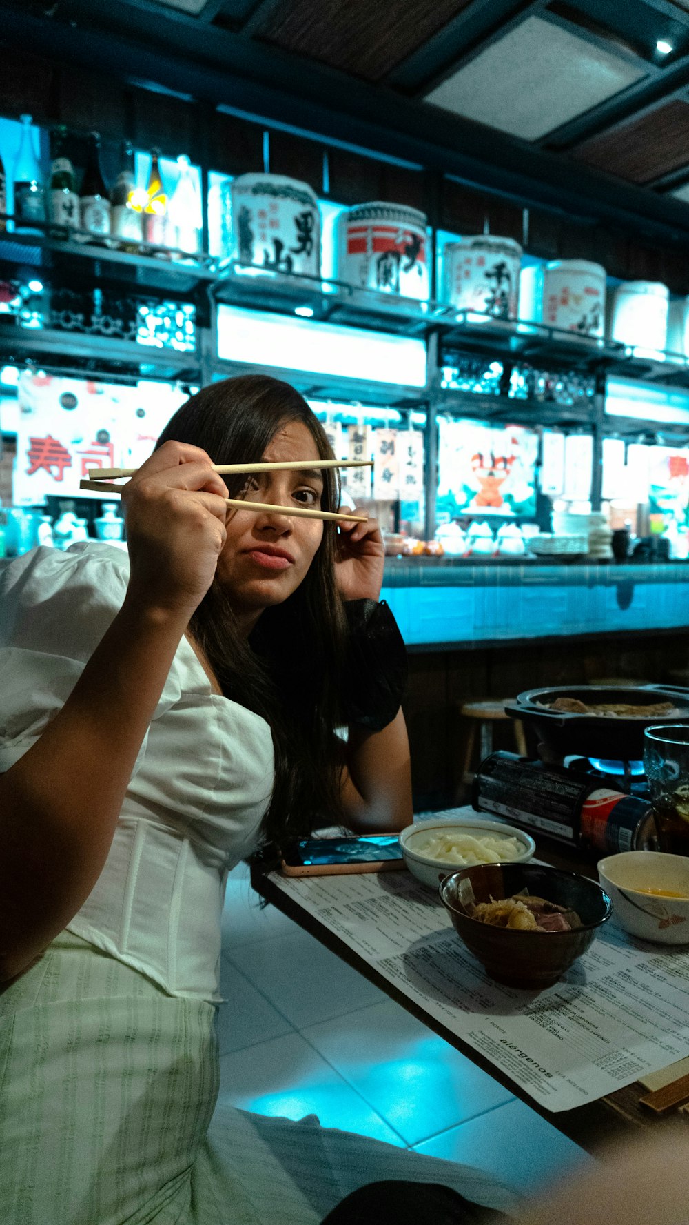 a person holding a pair of glasses