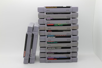 a stack of video games