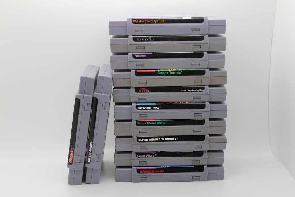 a stack of video games
