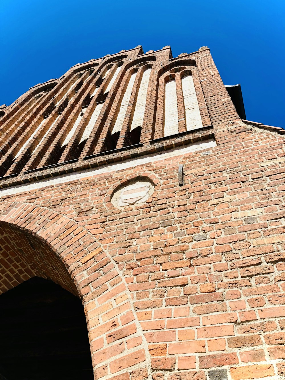 a brick building with a brick tower