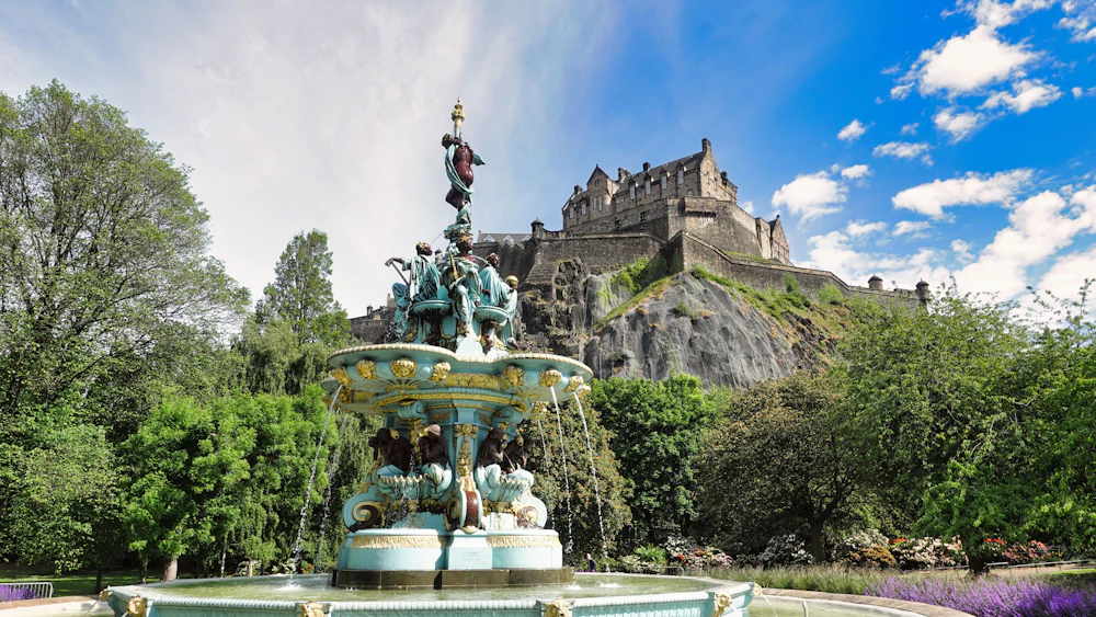 Edinburgh Castle perched on volcanic rock above the Royal Mile on a Scotland cultural school trip