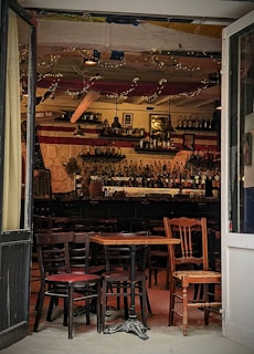 Interior shot of a cozy bar featuring Kentucky Barrel Pickers’ curated barrels on display.