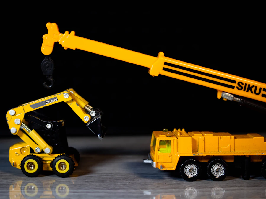 Varios camiones y máquinas de construcción amarillos a escala