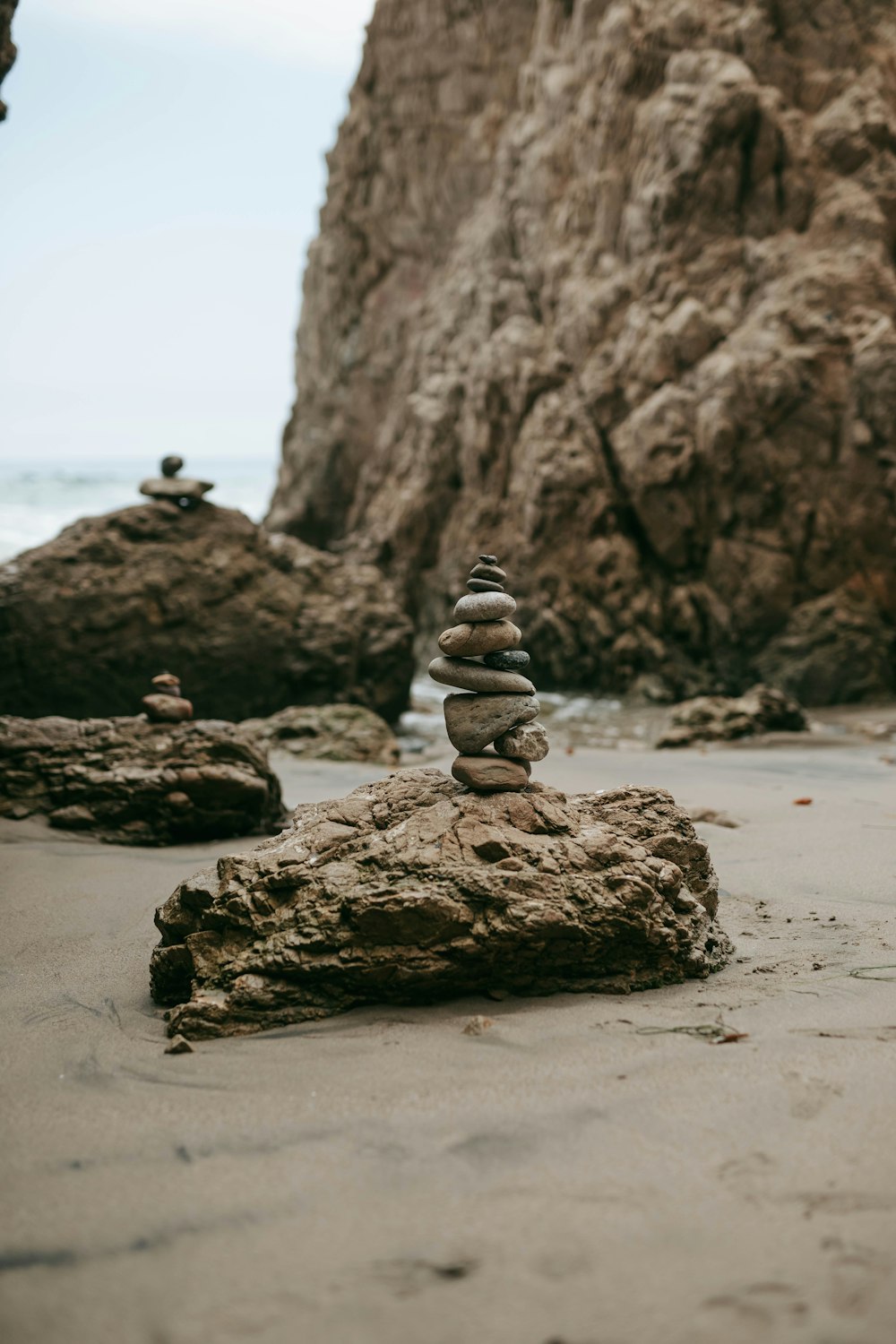 a stack of rocks on a beach