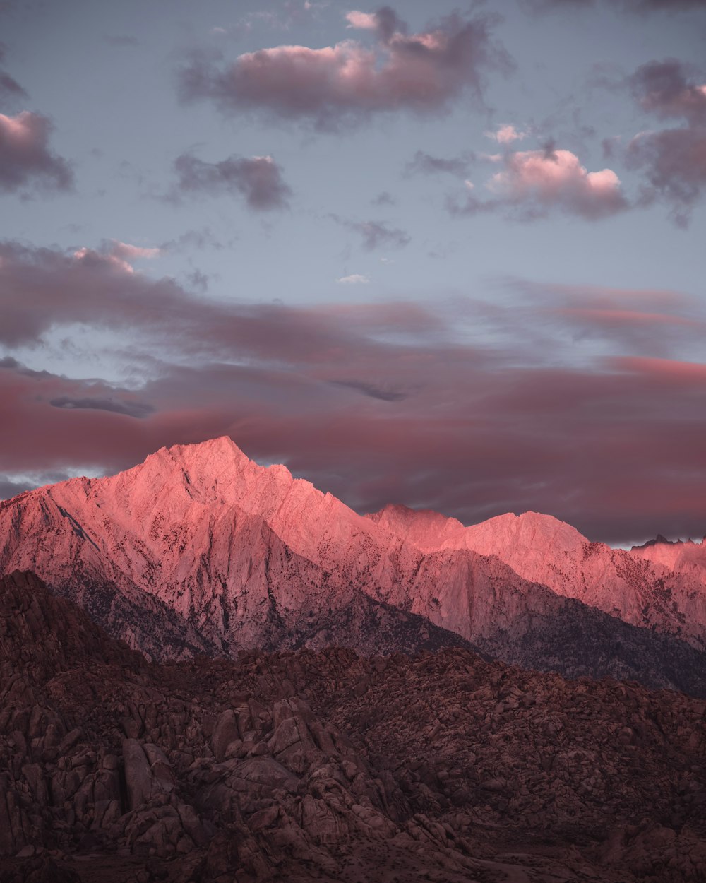 a mountain with clouds