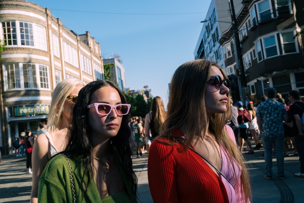 a group of people walking down a street