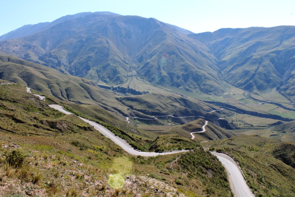 a winding road through a valley