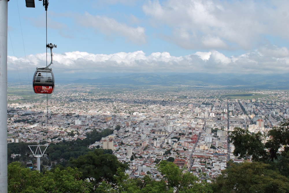 a cable car above a city