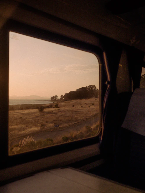 Train window at sunset