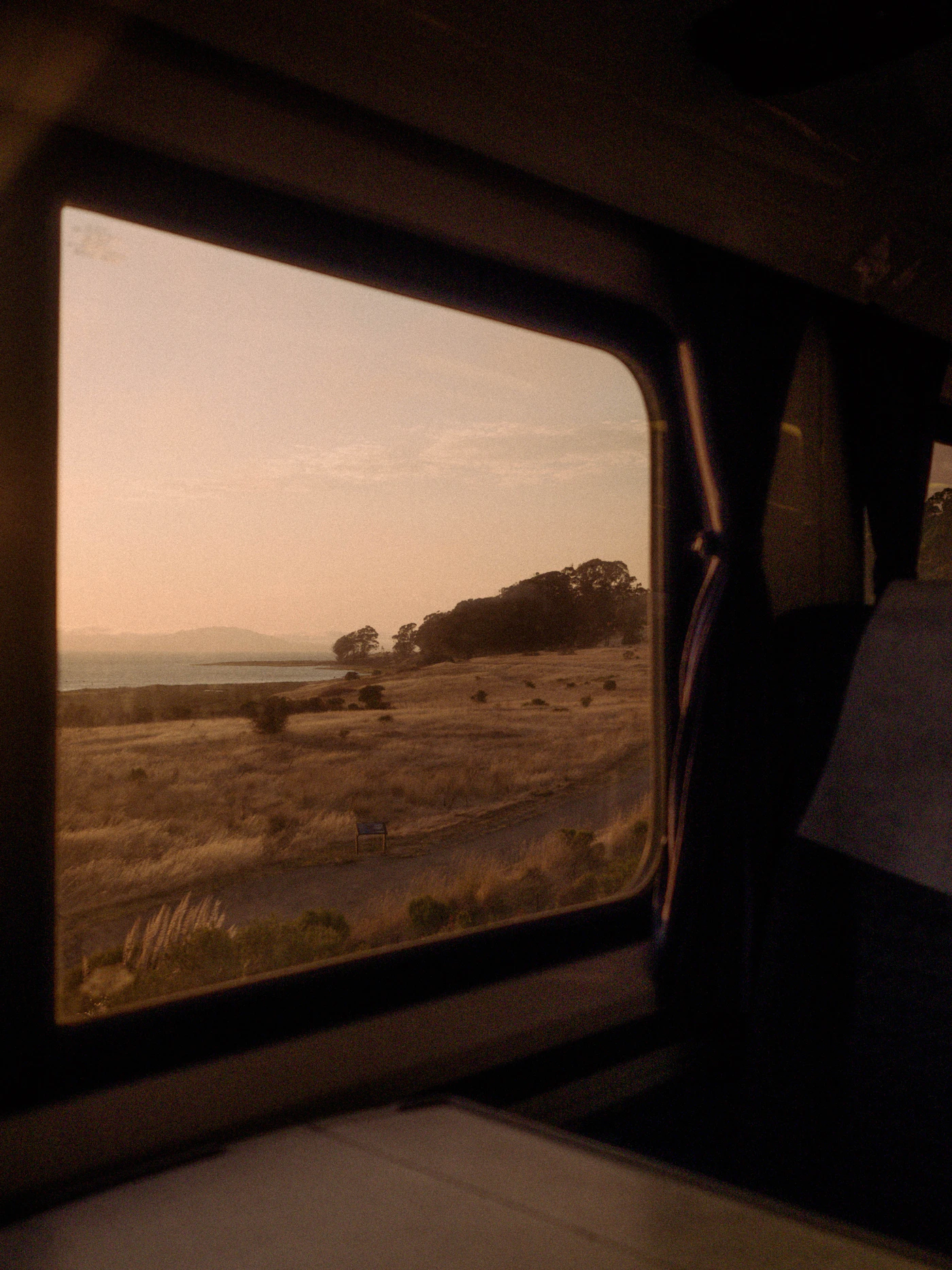 Sunset landscape through a train window