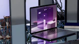 Realistic 3D laptop showing massage course content with golden accents on screen