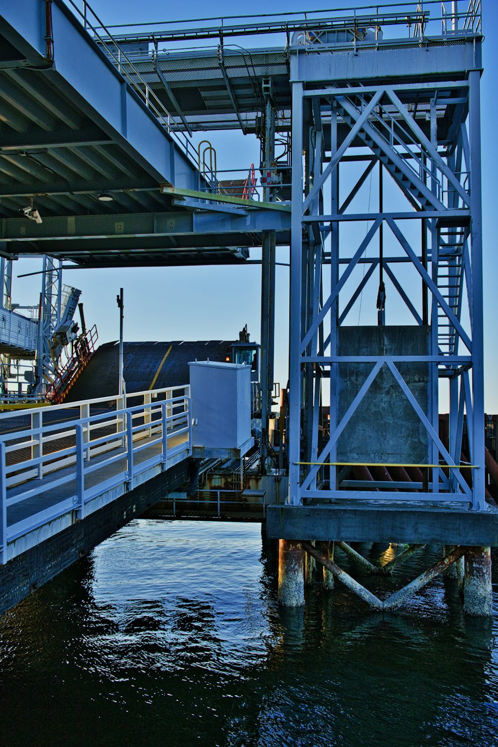 a large metal structure over water