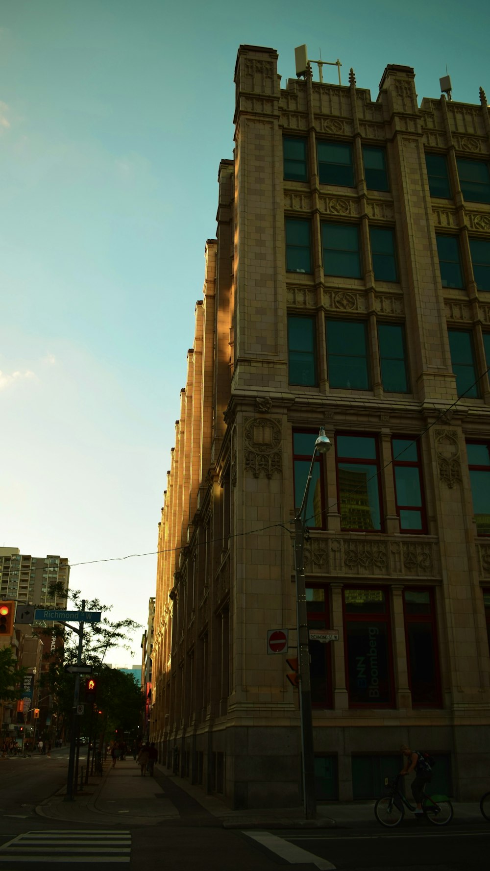 a tall building with a street light