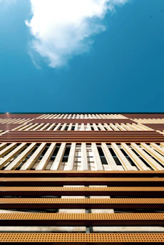 a building with a cloudy sky