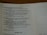 An open Bible displaying text from Psalm 150:6. The page is slightly curved and the text is in a serif font. Lighting is soft, creating a warm and inviting atmosphere.