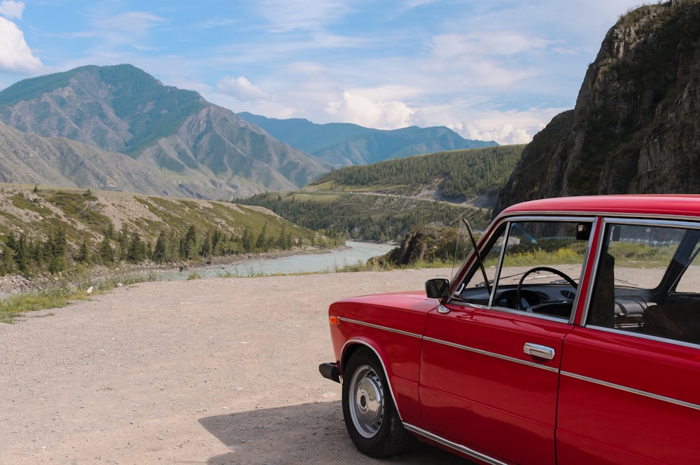 a red car parked on a road