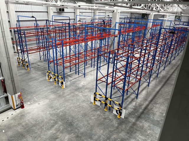 A professional installation of fire sprinklers in a large warehouse setting.