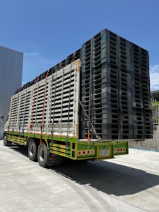 a large truck with a large container on the back