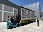 a person loading a large truck