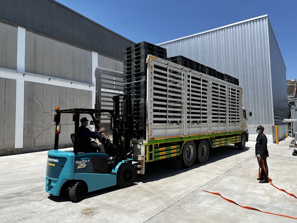 a person loading a large truck