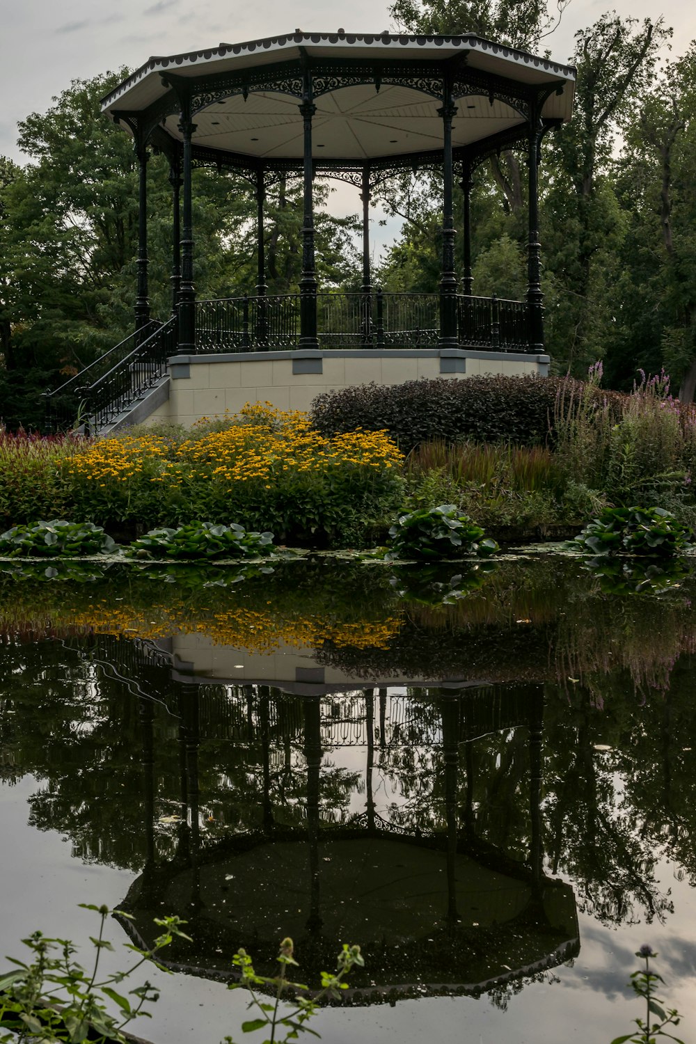 a gazebo over a pond