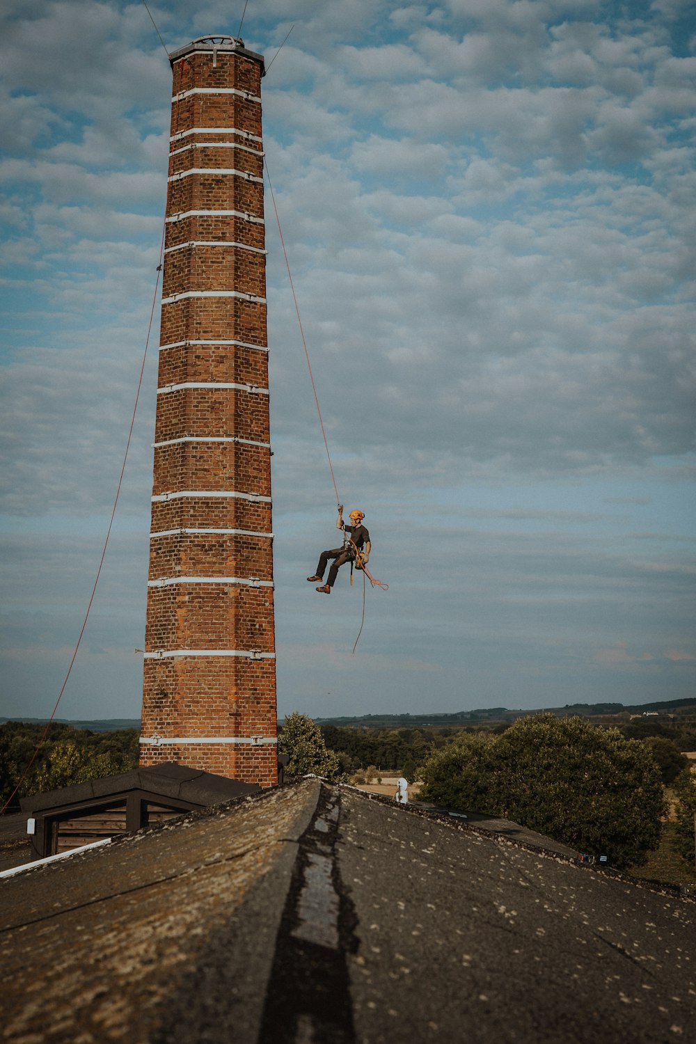 a person climbing a tower